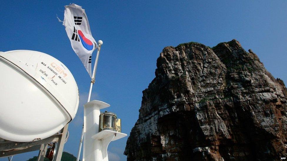 The South Korean national flag flies from a boat on Baengnyeong Island on 15 June, 2010