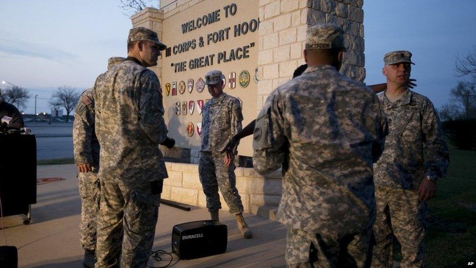 Military personnel wait after the Fort Hood shooting, 2 April