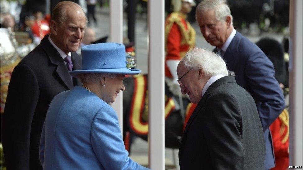 Michael D Higgins shaking hands with Queen Elizabeth II