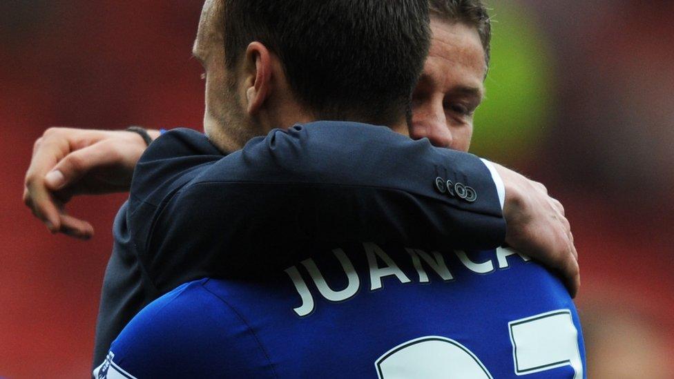 Cardiff City manager Ole Gunnar Solskjaer hugs goal-scorer Juan Cala after victory at Southampton