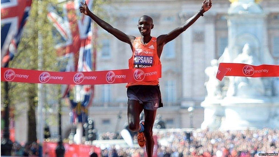 Wilson Kipsang of Kenya sprints down the Mall before crossing the finish line to win the men's elite London Marathon