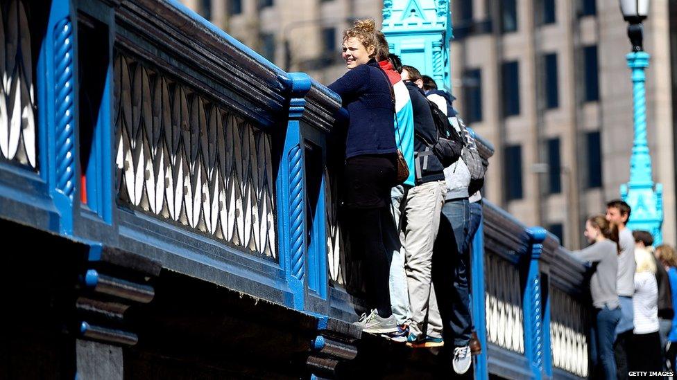 Spectators watch the London Marathon