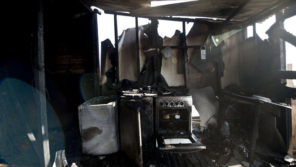 Picture taken on April 14, 2014 inside a house destroyed by a huge fire in Valparaiso.