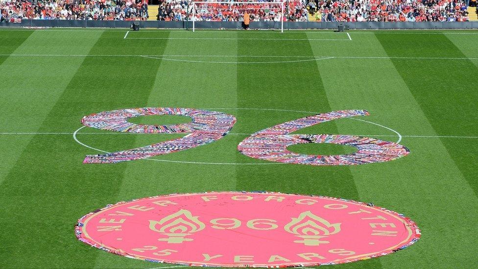 Scarves laid on the pitch