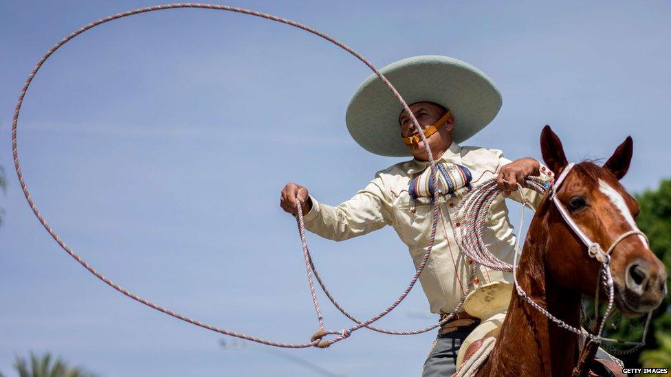 Over in America this cowboy shows off his lasso skills during a traditional Easter Sunday parade in Los Angeles.