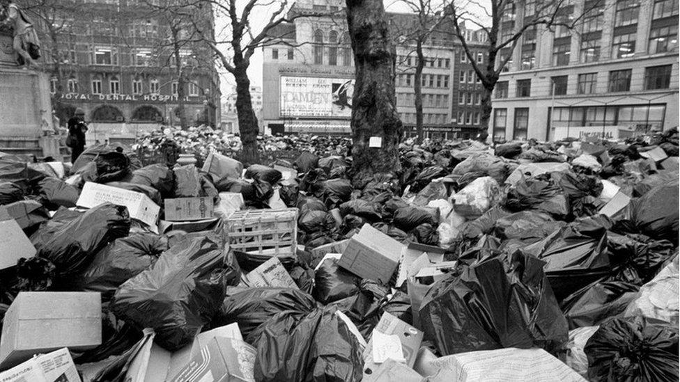 Rubbish piled high in Leicester Square, London