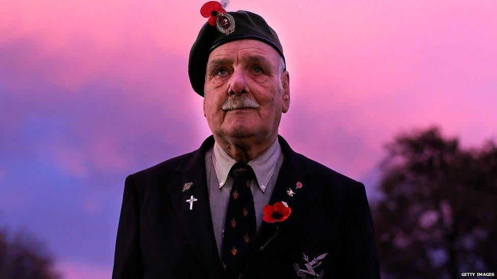 Former soldiers place poppies at a Memorial in Cranmer Square on 25 April, 2014 in Christchurch, New Zealand