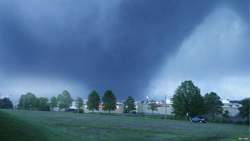 The funnel cloud is pictured from the Barnes Crossing area of Tupelo as the tornado made its way across town on Tupelo, Mississippi on 28 April 2014.