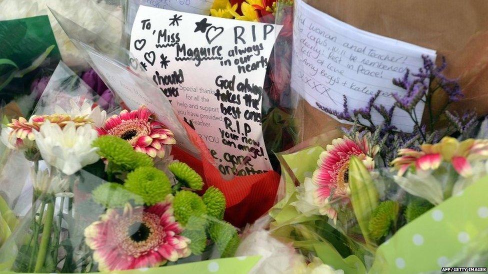 Tributes left outside Corpus Christi Catholic College in Leeds