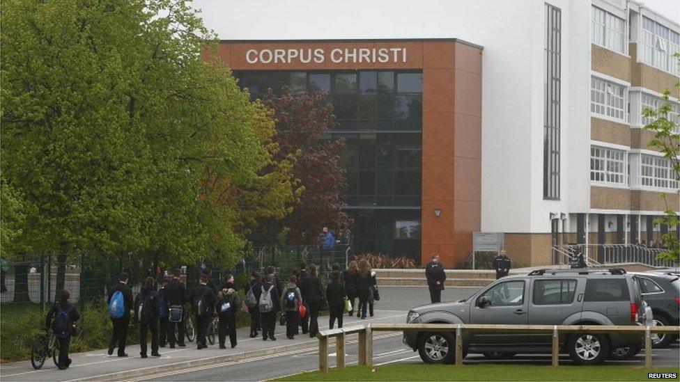 Pupils arrive at Corpus Christi Catholic College where teacher Ann Maguire was fatally stabbed in Leeds