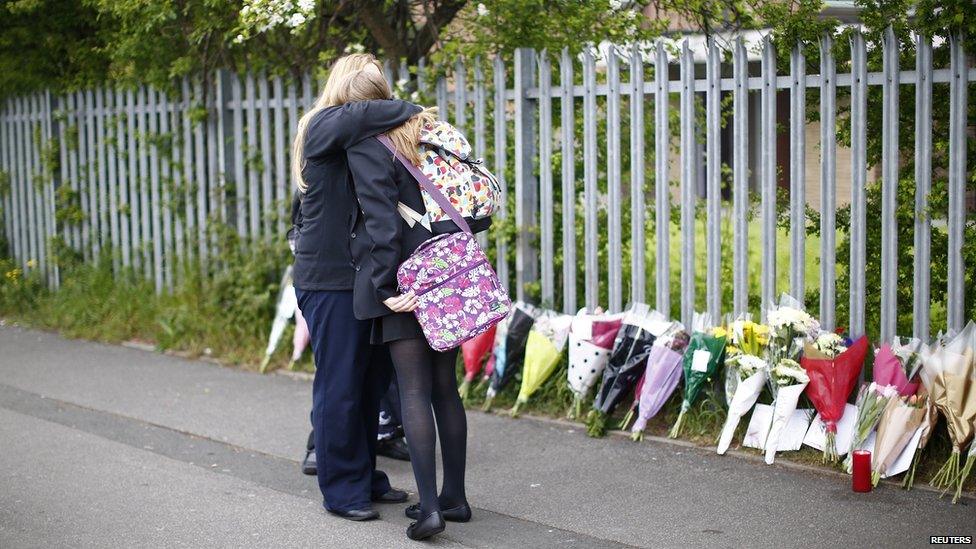 Tribute scene outside the school