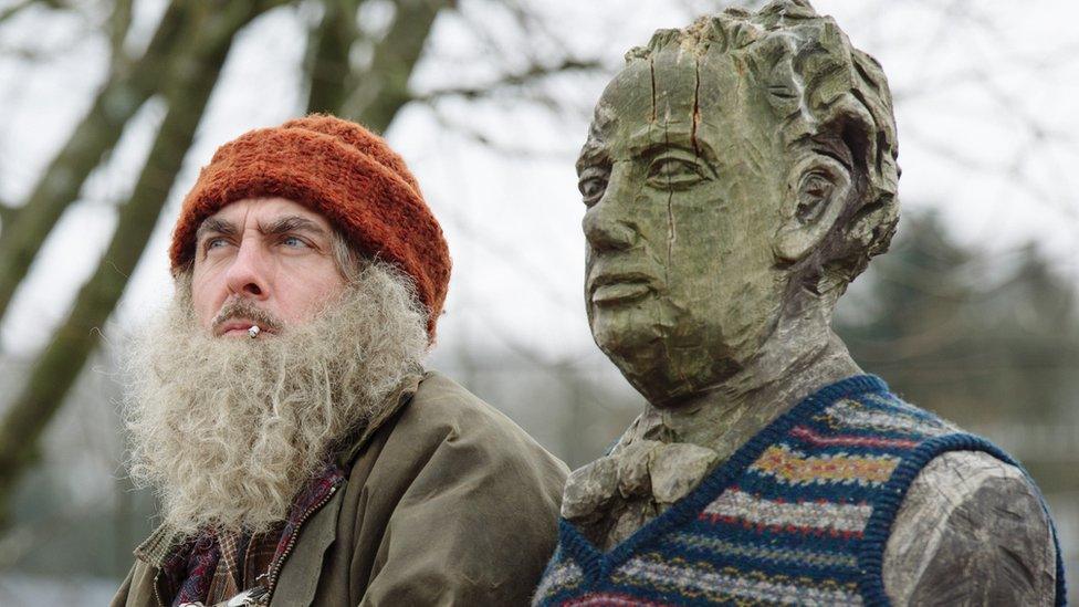 Russell Gomer with a bust of Dylan Thomas