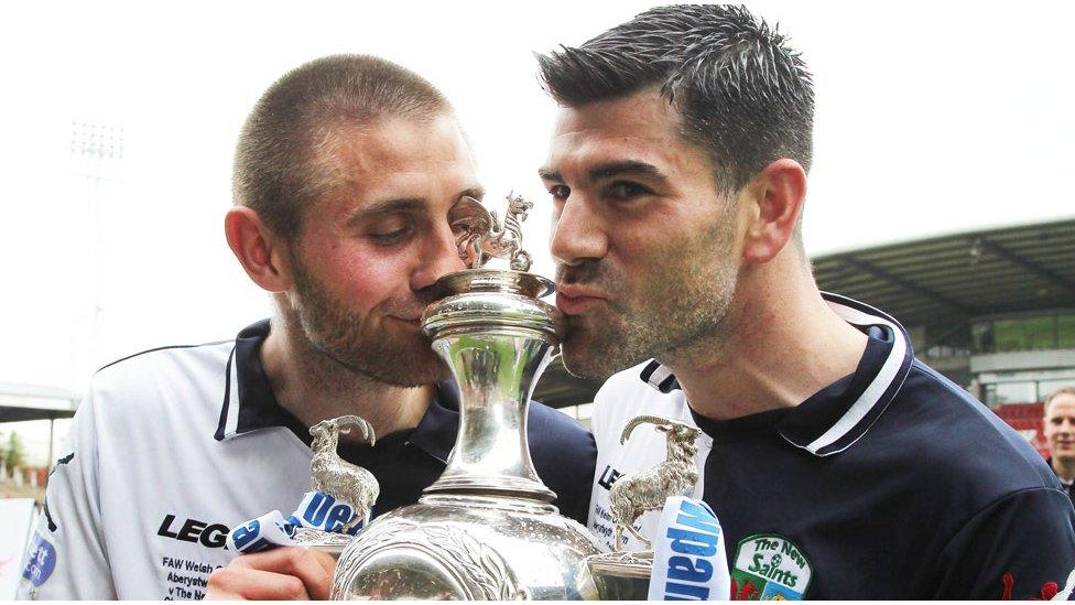 TNS goalscorers Greg Draper and Mike Wilde kiss the Welsh Cup after the 3-2 win over Aberystwyth