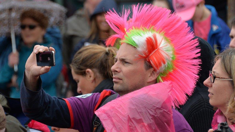 Fans were again bedecked in pink as the Giro headed from Belfast to the north coast of Northern Ireland on stage two of the Grand Tour event