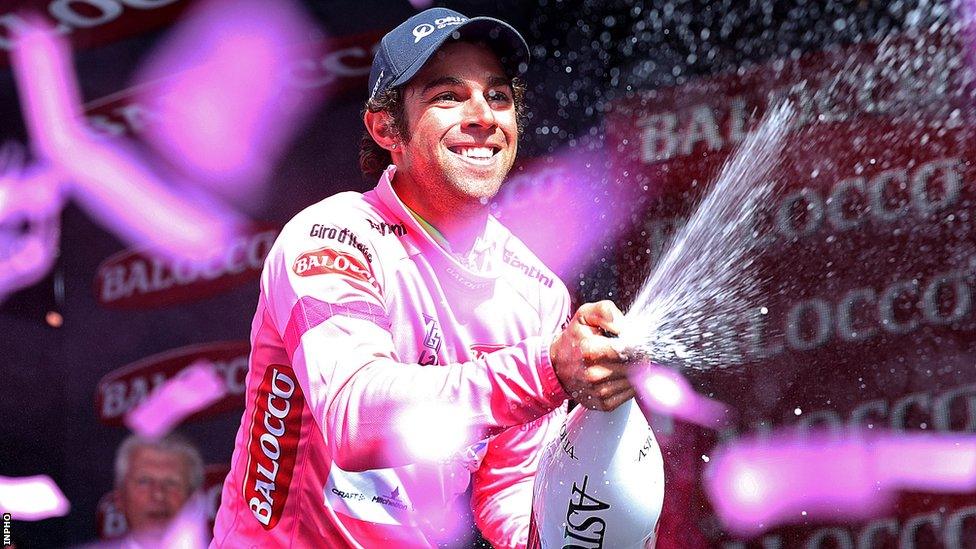 Michael Matthews celebrates as he holds on to the leader's pink jersey after Sunday's stage finish in Dublin