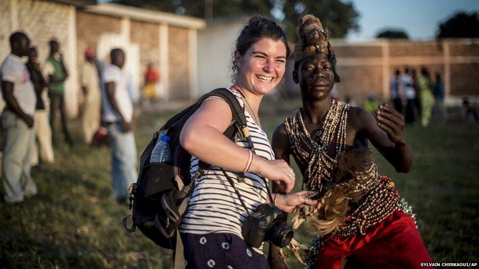 French photojournalist Camille Lepage with a local dancer in Bangui, 2013