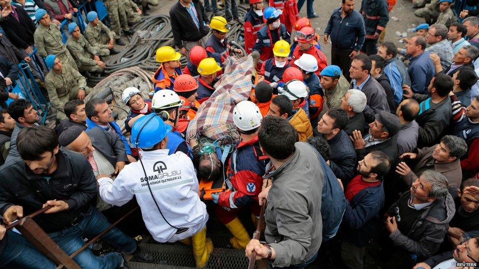 Injured miner carried to an ambulance in Soma, Manisa province, Turkey, on 14 May 2104