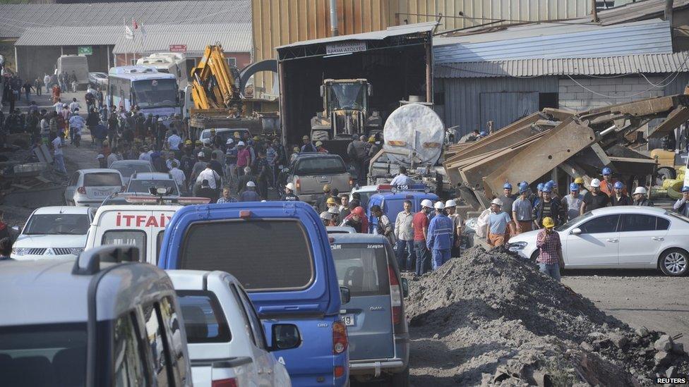 Search and rescue teams and officials are seen around a coal mine where miners are trapped near Soma, a district in Turkey's western province of Manisa May 13