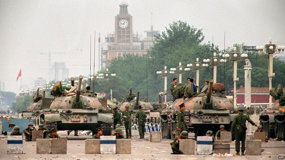 People's Liberation Army tanks guard Chang'an Avenue, leading to Tiananmen Square, 6 June 1989