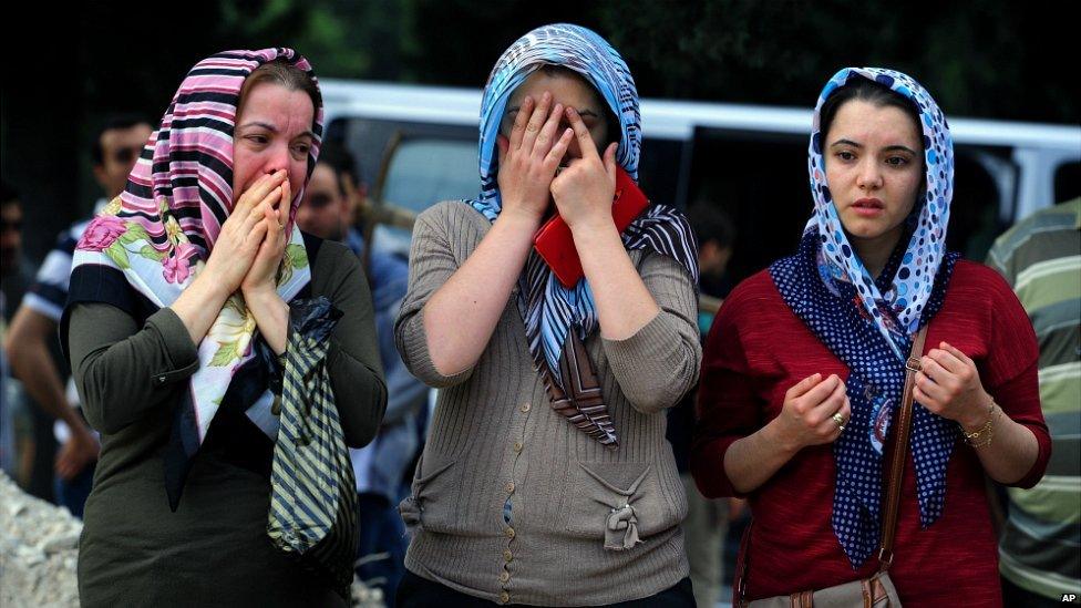 People attend a funeral for the victim of someone who died in the mining accident in Soma - 14 May 2014