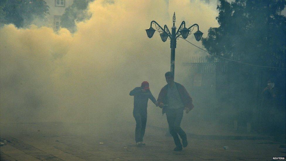 Riot police fire tear gas against protesters in Ankara who blame the ruling AK Party for the mining disaster - 14 May 2014