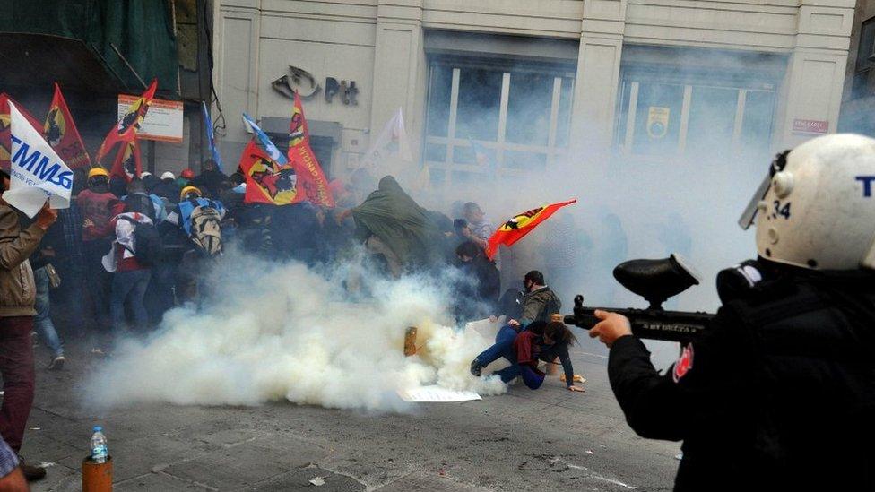 Riot police disperse protestors with tear gas and rubber bullets during a protest in Istanbul - 14 May 2014