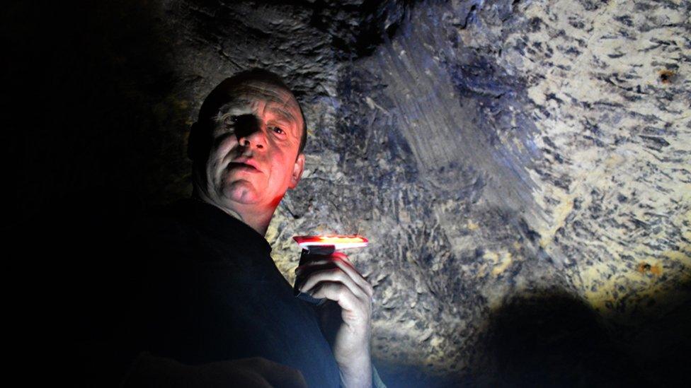 Paul O'Shea in his cave