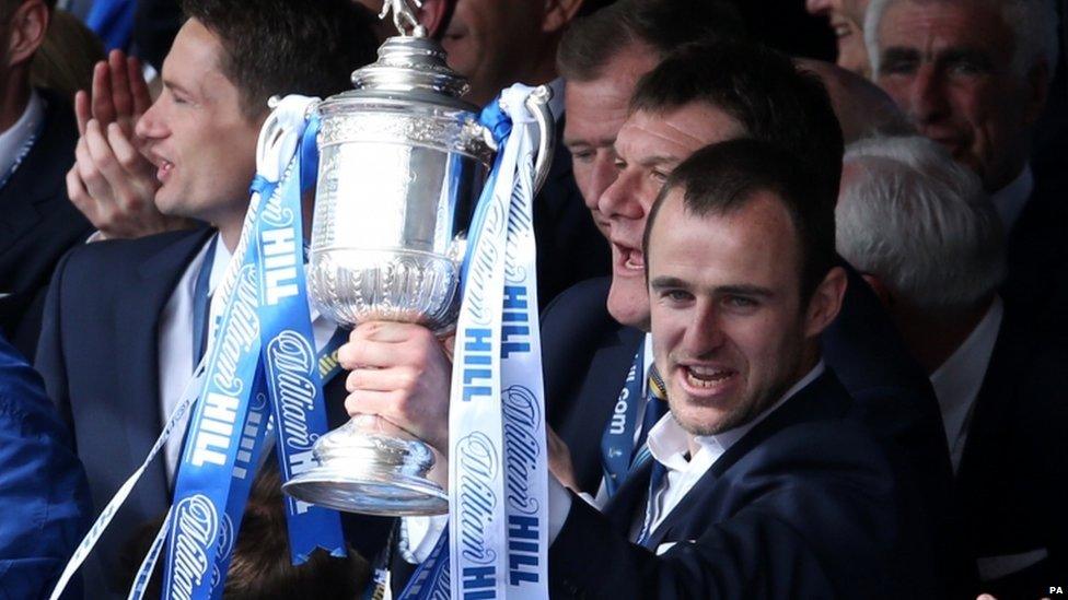 St Johnstone captain David MacKay on stage at the end of the parade