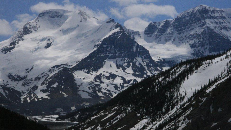 Glaciers along the Continental Divide, Alberta, May 2007. Glacier- and snow-fed systems provide the backbone of water supply not only in Western Canada but also in many other regions in the world.