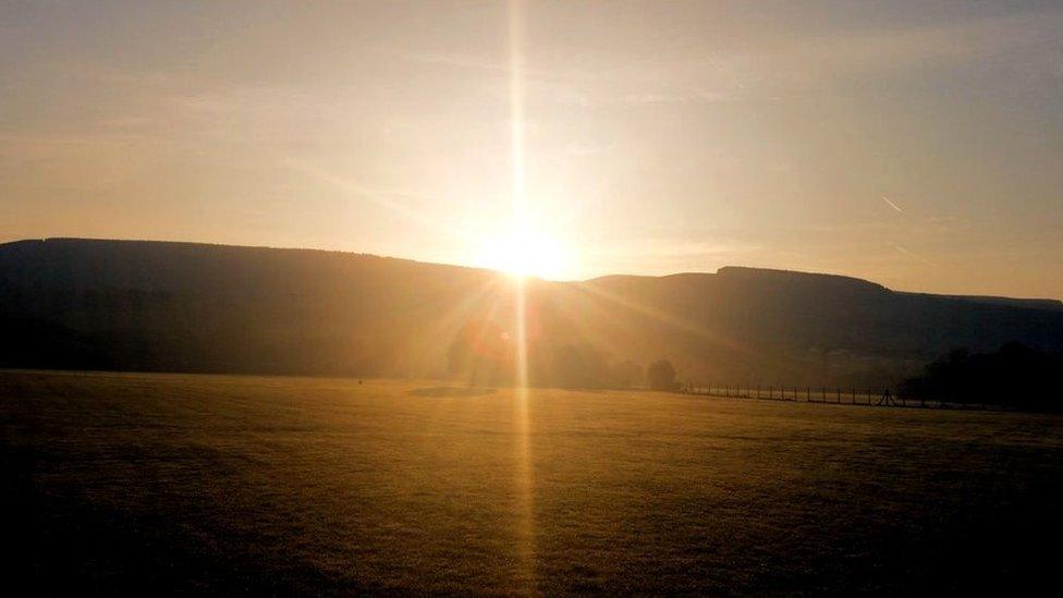 The sun rising over Cwmbach, Aberdare