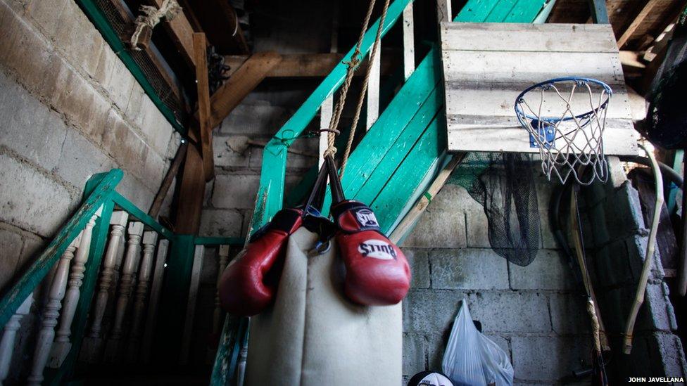 A makeshift basketball court is seen inside of a residence in Pamarawan, Malolos Bulcan Province in the Philippines.