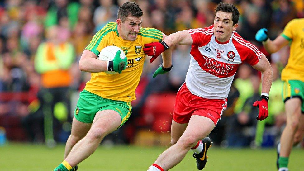 Donegal forward Patrick McBrearty tries to get away from Derry opponent Ryan McBride during the Championship game at Celtic Park