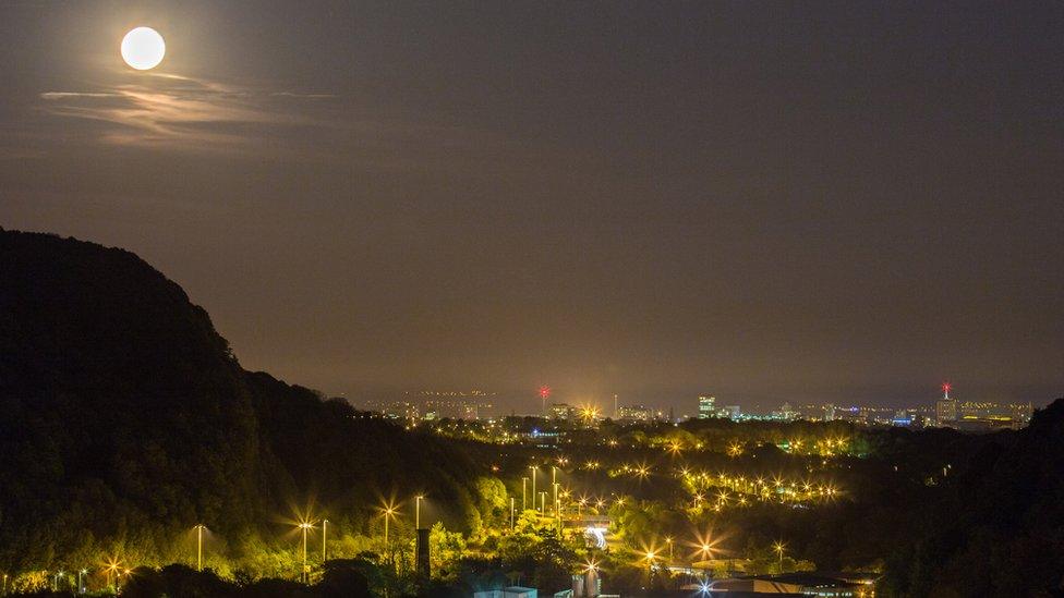 Moon rising over Cardiff. Pete Anning's photograph taken from Gwaelod-y-Garth