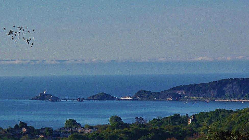 Richard Hammond from Killay, Swansea, captured this view of Mumbles head in Swansea Bay early in the morning at high tide