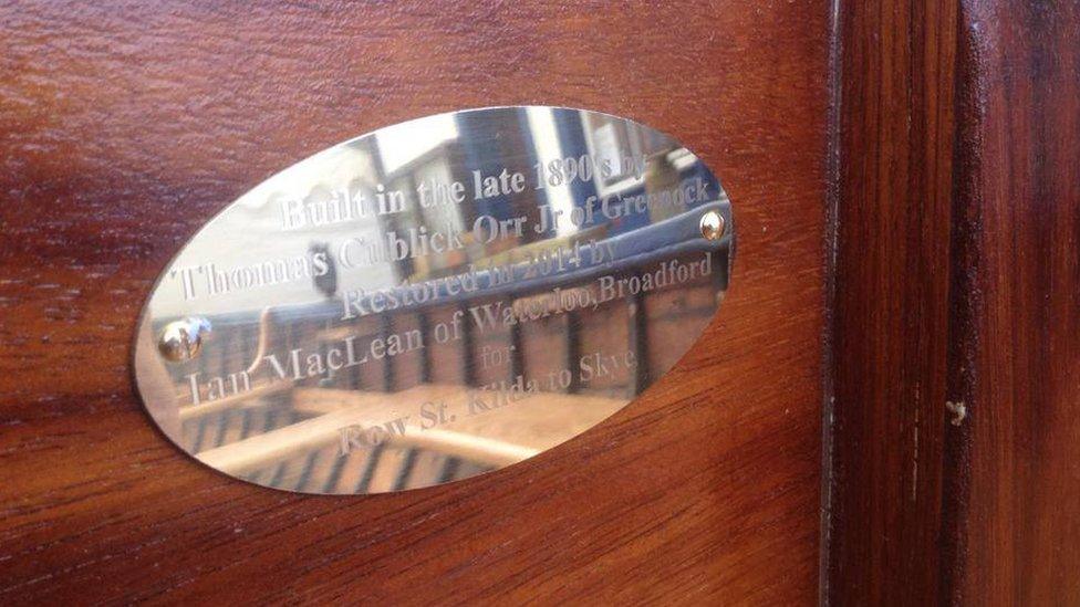 Plaque on rowing boat Aurora