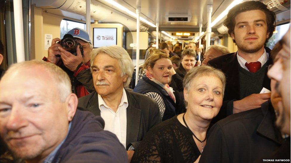 Passengers on first tram service