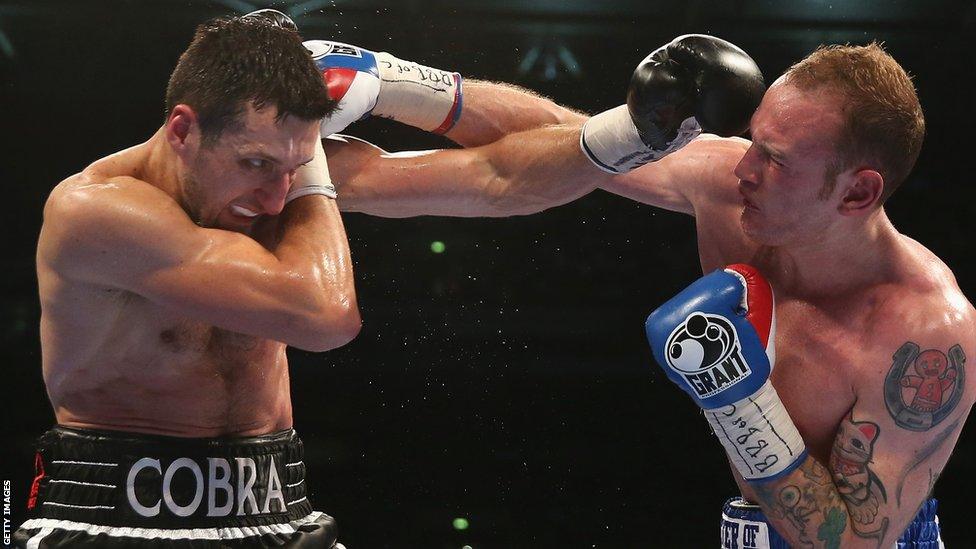 By the fifth round, Carl Froch had managed to draw George Groves out and the pair traded punches in the centre of the ring - the champion landing the heavier shots