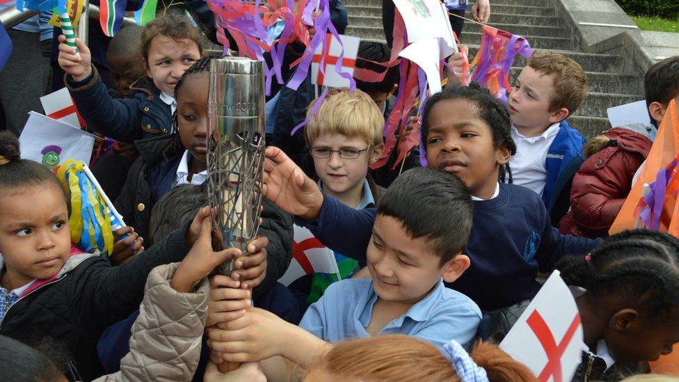 Children holding the baton in Sunset Park, Birmingham