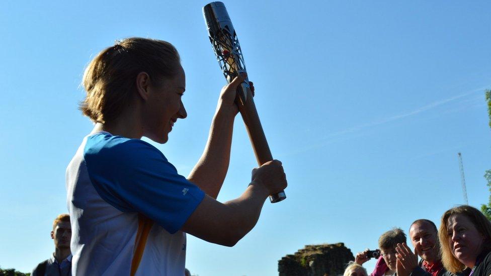 Lizzy Yarnold with the baton at Tonbridge Castle