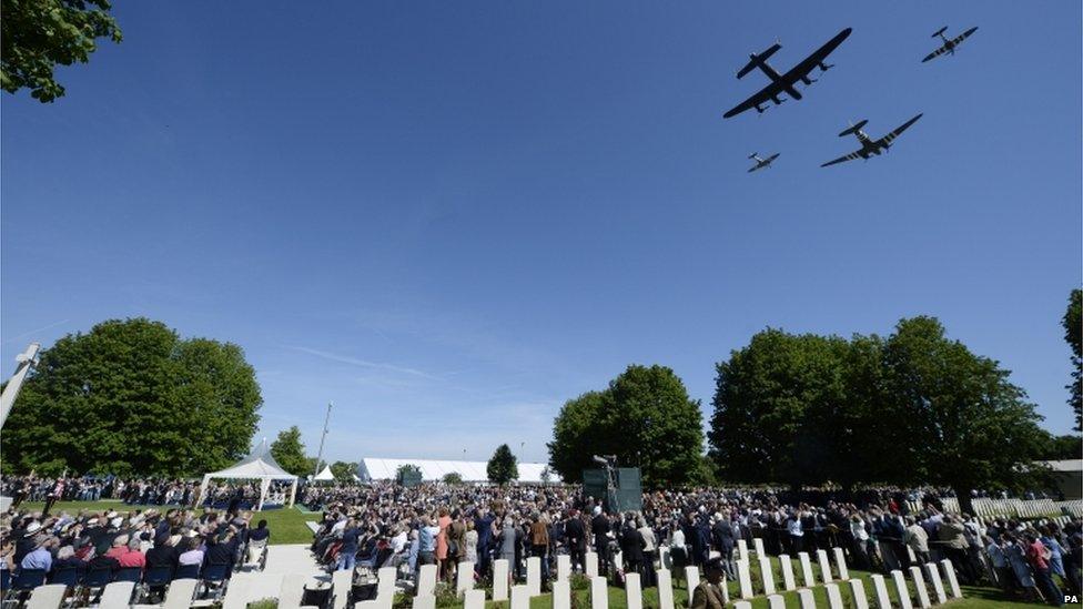 The fly-past before the Service of Remembrance at the Commonwealth War Graves Commission Cemetery, Bayeux