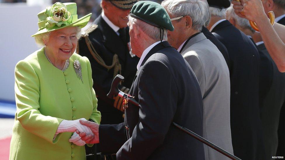 The Queen and the Duke of Edinburgh greet veterans at the International 70th D-Day Commemoration Ceremony at Sword Beach in Ouistreham