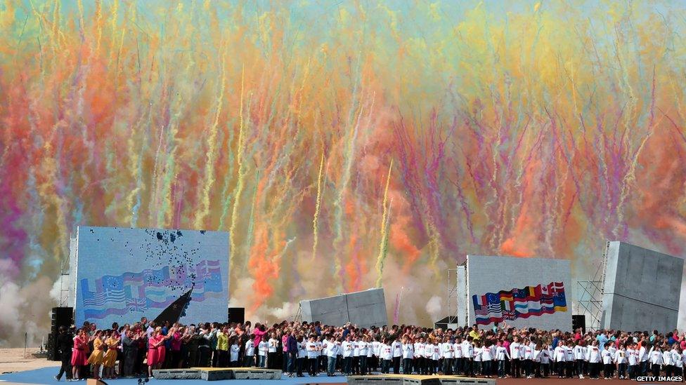 Artists perform during the international D-Day commemoration ceremony