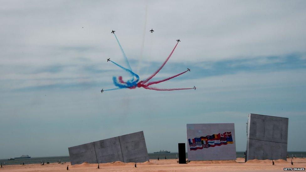 Alpha jets, part of the Patrouille Acrobatique de France, carry out a fly-past