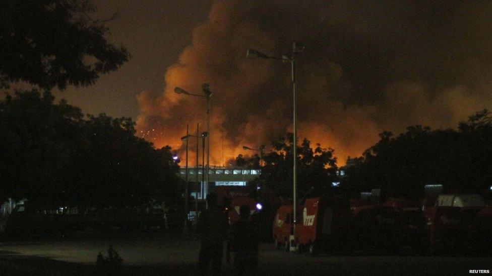 Smoke billows from Jinnah International Airport in Karachi