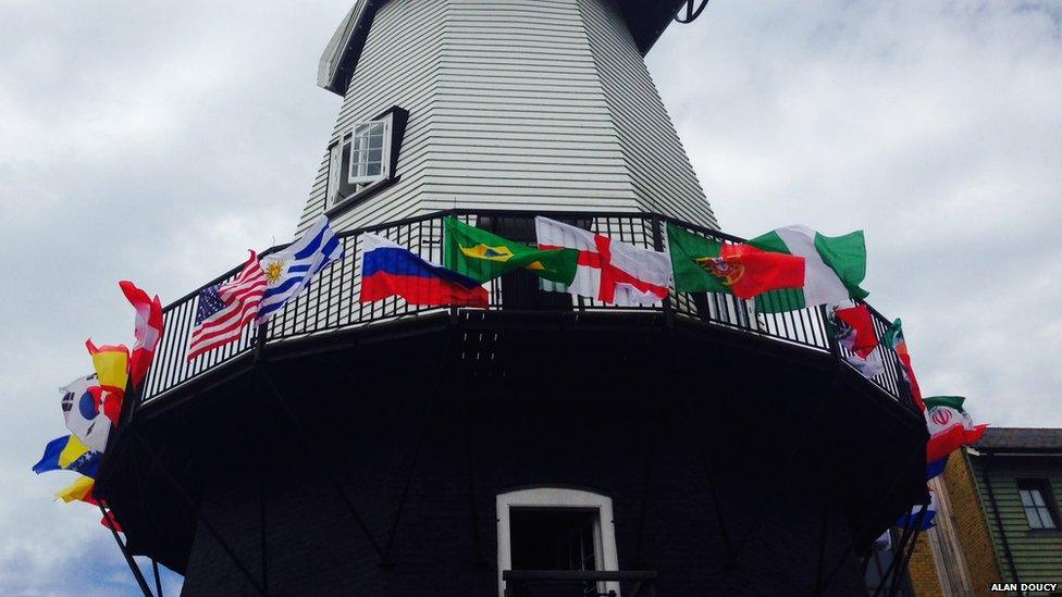 Sharrocks Windmill, in Kent, covered in world cup flags