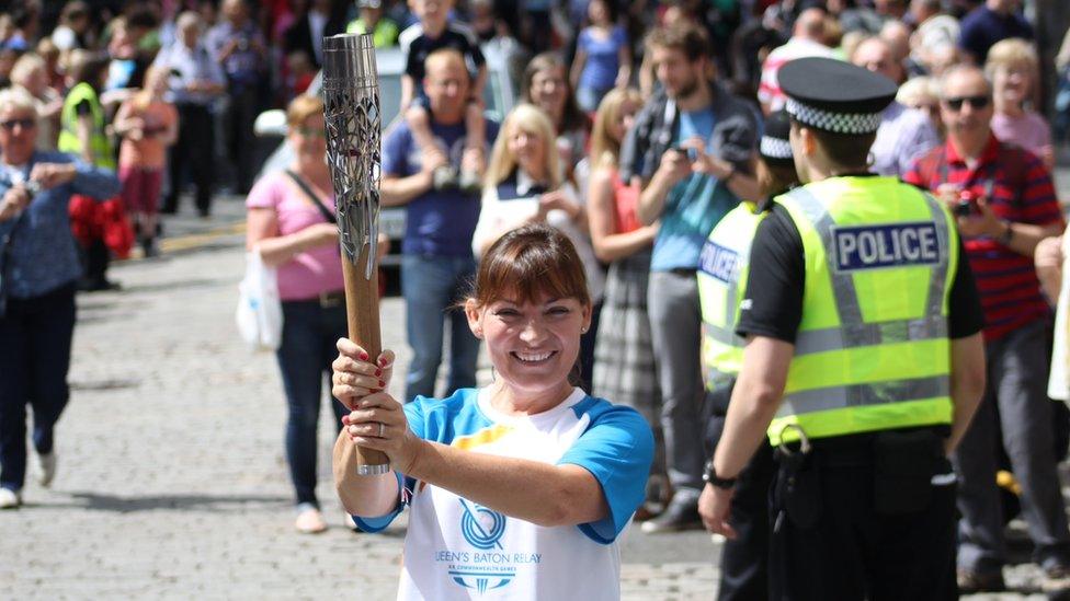 TV presenter Lorraine Kelly carried the baton on the Royal Mile