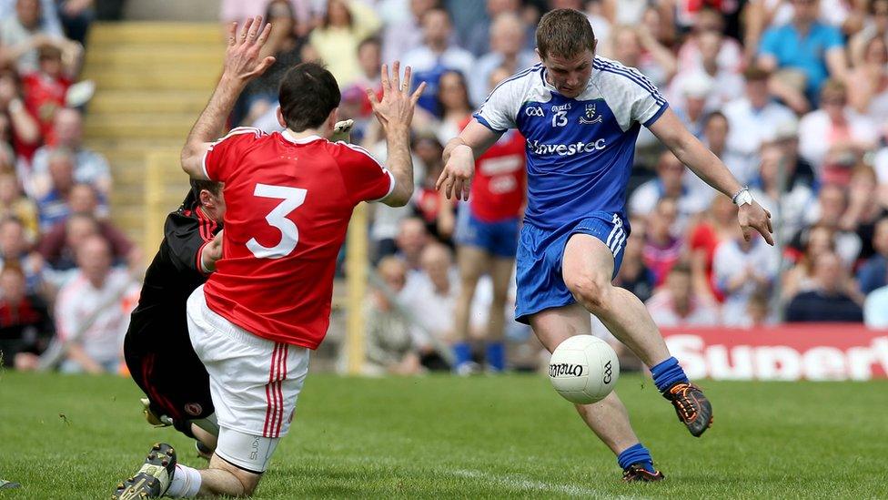 Tyrone keeper Niall Morgan and defender Justin McMahon cannot stop Monaghan corner-forward Dermot Malone from scoring the all-important goal