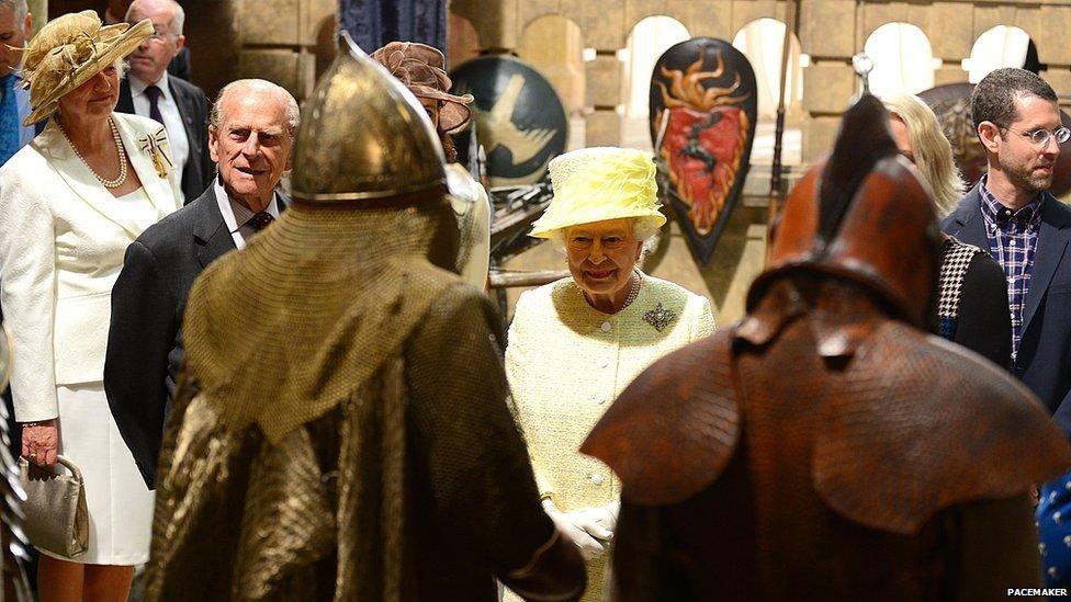 The Queen and Duke of Edinburgh admire the costumes used in Game of Thrones