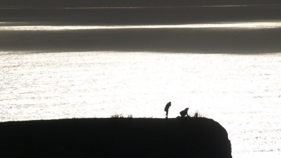 Two walkers at Rhossili, Gower