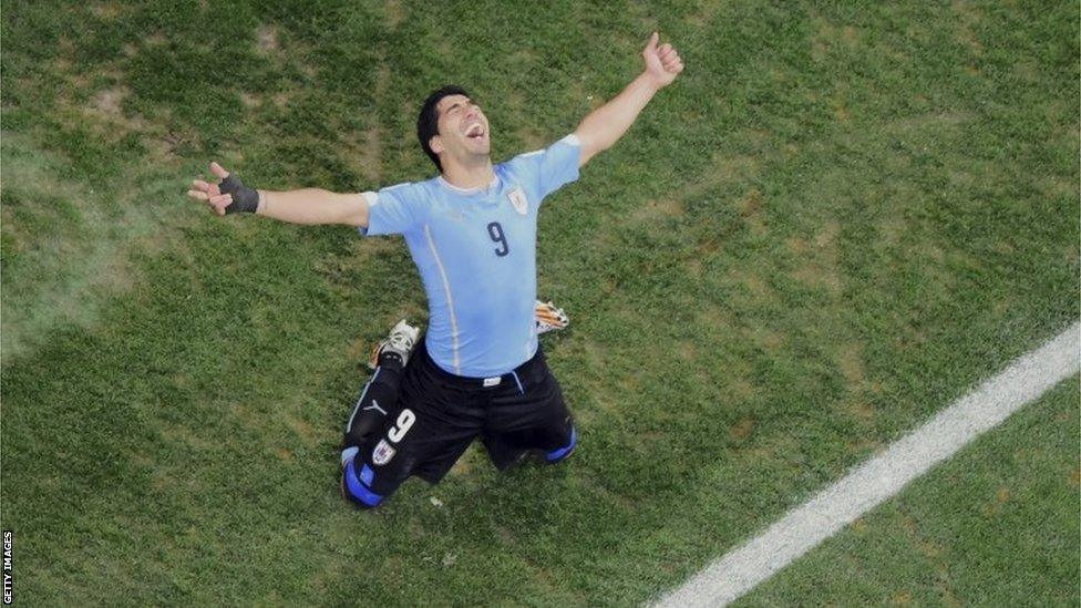 Uruguay's Luis Suarez celebrates scoring his side's second goal during the Group D World Cup match between Uruguay and England at the Itaquerao Stadium in Sao Paulo, Brazil.